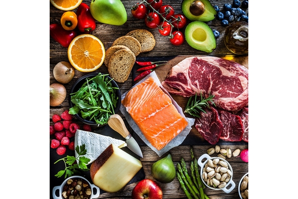 Image Assorted fresh foods including salmon, beef, cheese, fruits, vegetables, bread, and nuts